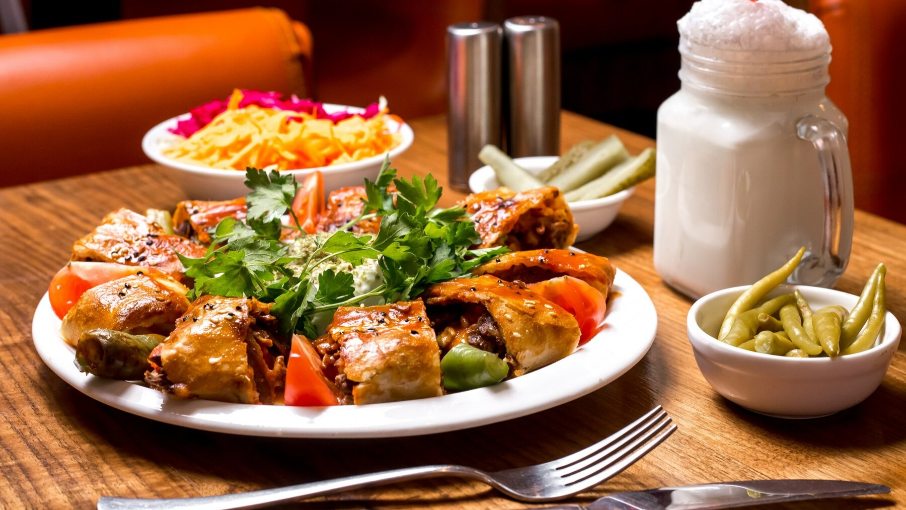 beyti-kebab-served-with-ayran-pickles_141793-1870